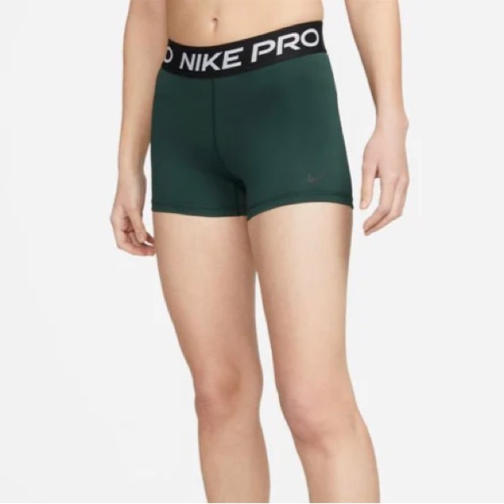 Green Nike Pros

- 78-83% polyester 17-22% spandex

- Machine wash